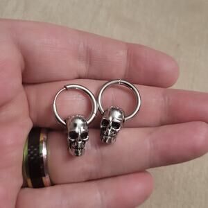 Men's silver mini hoop earrings with skull charms
